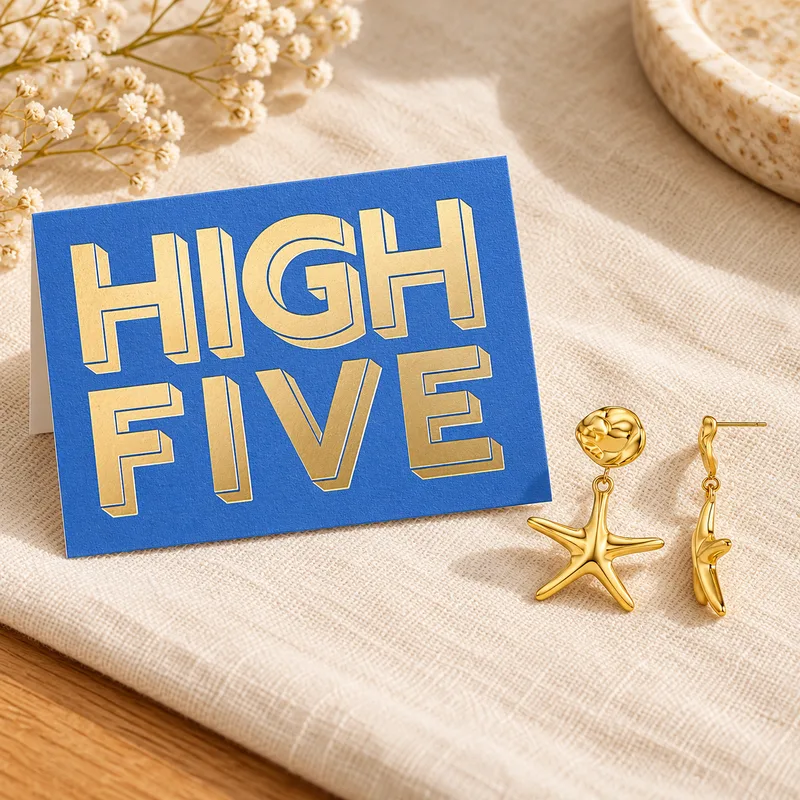 Gold starfish earrings and High Five