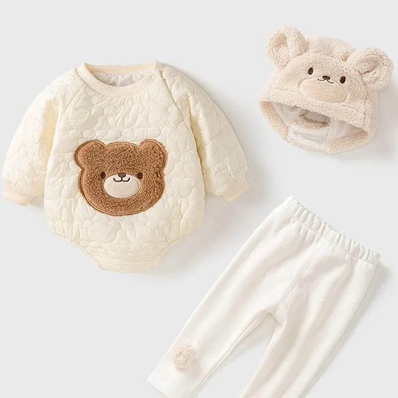 A cream baby bodysuit with a teddy bear face, matching leggings and a bear-ear hat